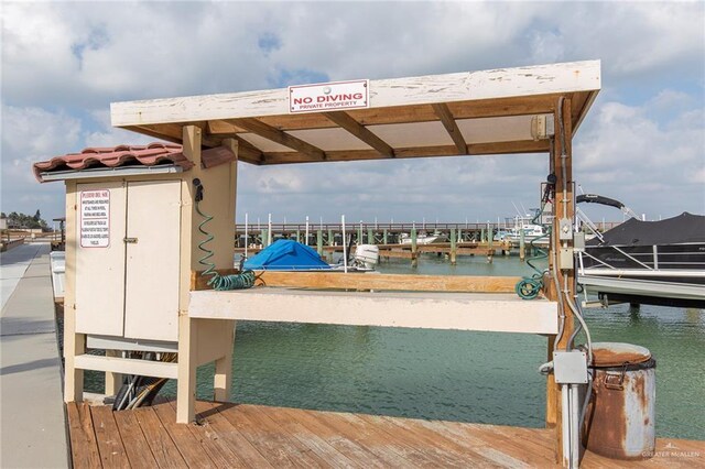 310 E Houston St Unit 1403, Port Isabel, TX 78578 - dock area featuring a water view and boat lift