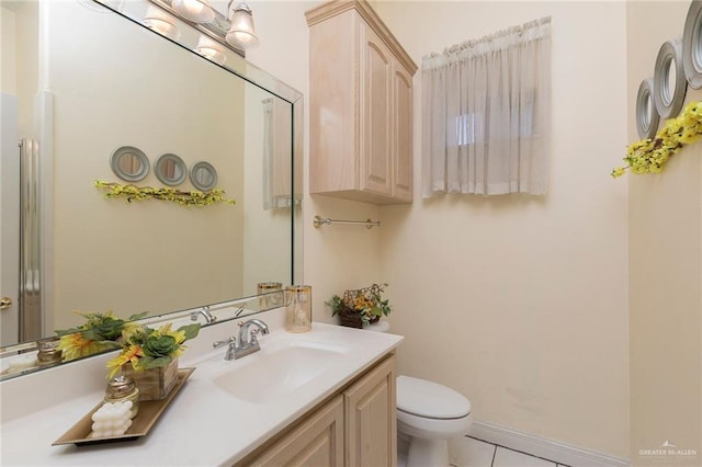 3305 W San Luis Cir, Mission, TX 78573 - bathroom with tile patterned floors, toilet, and vanity