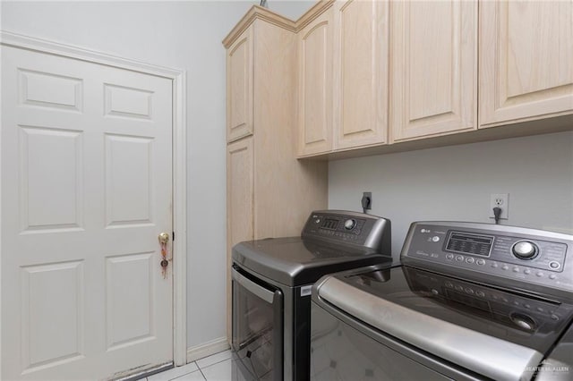 3305 W San Luis Cir, Mission, TX 78573 - laundry room with washing machine and dryer, cabinet space, light tile patterned flooring, and baseboards