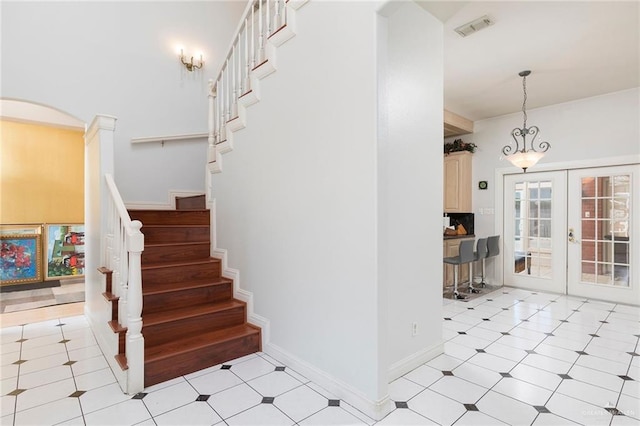 3305 W San Luis Cir, Mission, TX 78573 - stairway featuring french doors and arched walkways