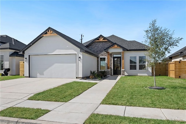 view of front facade featuring a front lawn and a garage