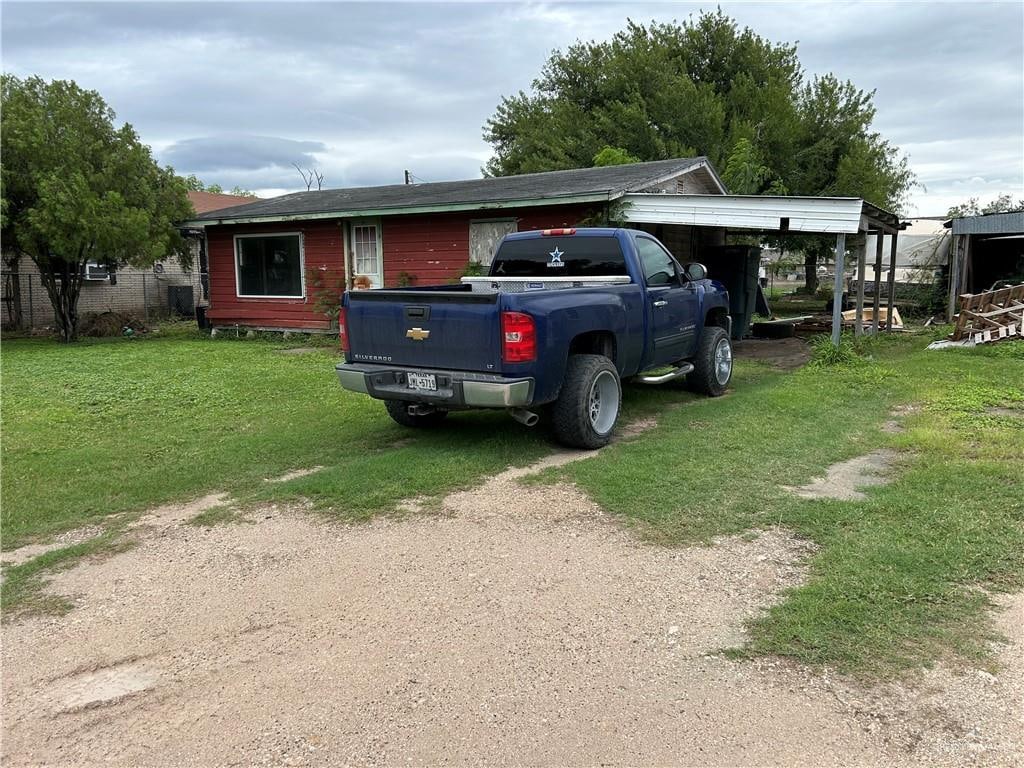 exterior space with a front yard