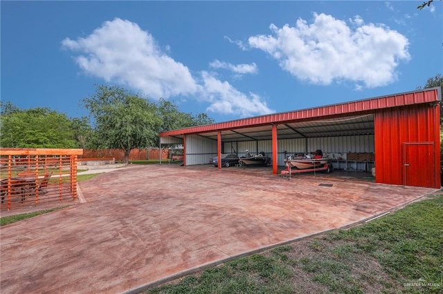 1900 E 2 Mile Line Rd, Mission, TX 78574 - view of parking featuring a pole building