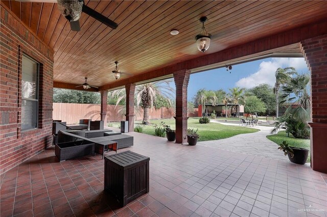 1900 E 2 Mile Line Rd, Mission, TX 78574 - view of patio with ceiling fan and fence