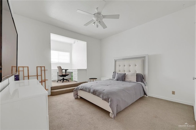 1900 E 2 Mile Line Rd, Mission, TX 78574 - bedroom with light colored carpet, baseboards, and ceiling fan