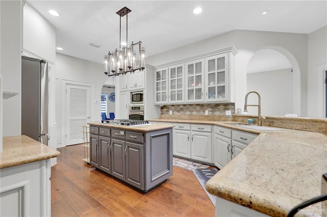 1900 E 2 Mile Line Rd, Mission, TX 78574 - kitchen with white cabinets, gray cabinets, appliances with stainless steel finishes, and a sink