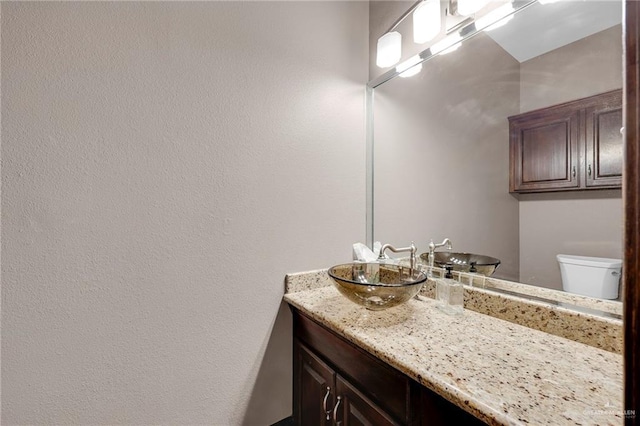 1900 E 2 Mile Line Rd, Mission, TX 78574 - bathroom with vanity and toilet