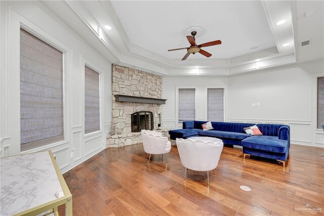 1900 E 2 Mile Line Rd, Mission, TX 78574 - living room with ceiling fan, visible vents, wood finished floors, and a raised ceiling