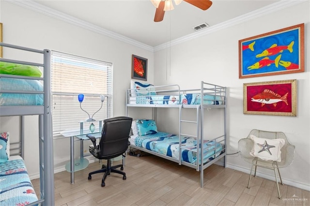 102 E Gardenia St, South Padre Island, TX 78597 - bedroom featuring visible vents, baseboards, wood finished floors, ceiling fan, and ornamental molding