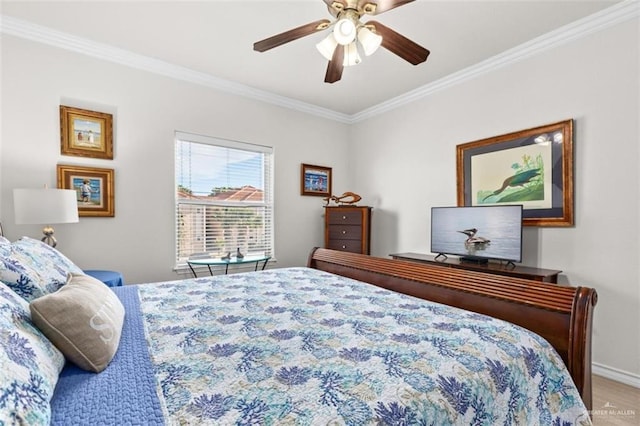 102 E Gardenia St, South Padre Island, TX 78597 - bedroom with a ceiling fan, baseboards, and crown molding