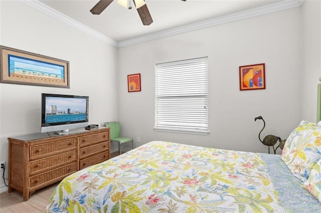 102 E Gardenia St, South Padre Island, TX 78597 - bedroom featuring ceiling fan, crown molding, and wood finished floors