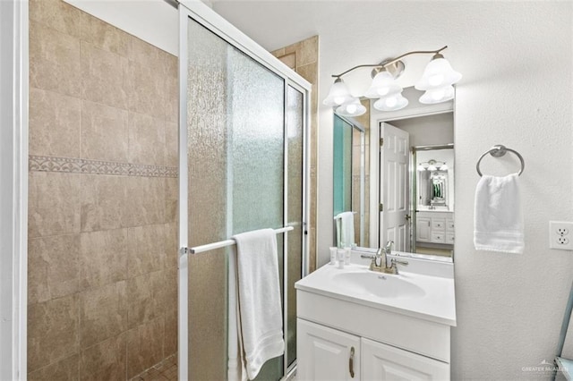 102 E Gardenia St, South Padre Island, TX 78597 - bathroom with vanity and a stall shower