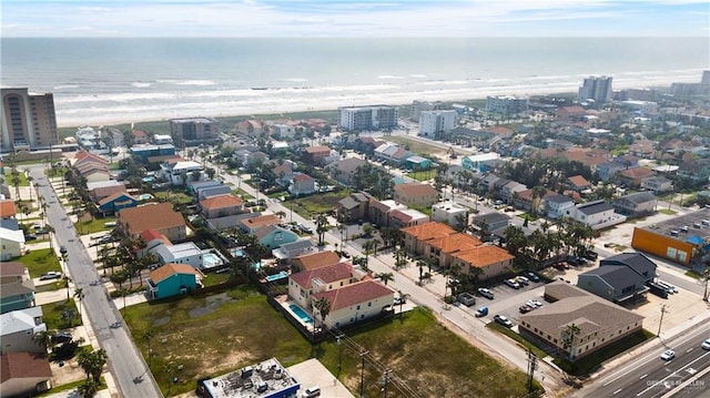 102 E Gardenia St, South Padre Island, TX 78597 - birds eye view of property featuring a city view and a water view