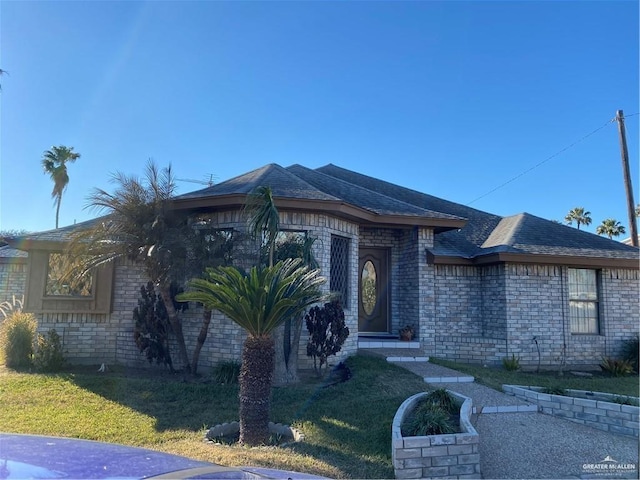 view of front of house with a front lawn