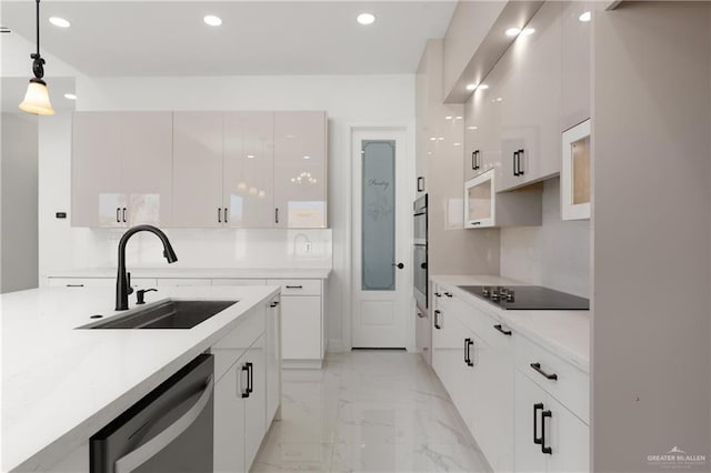kitchen with black electric cooktop, a sink, modern cabinets, marble finish floor, and dishwasher