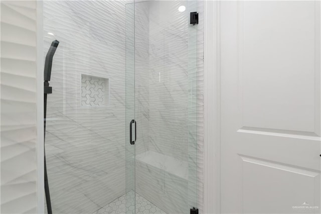 bathroom featuring a stall shower