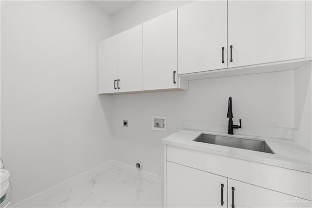 clothes washing area with a sink, washer hookup, marble finish floor, cabinet space, and electric dryer hookup