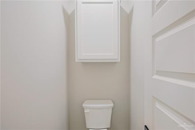 bathroom featuring toilet