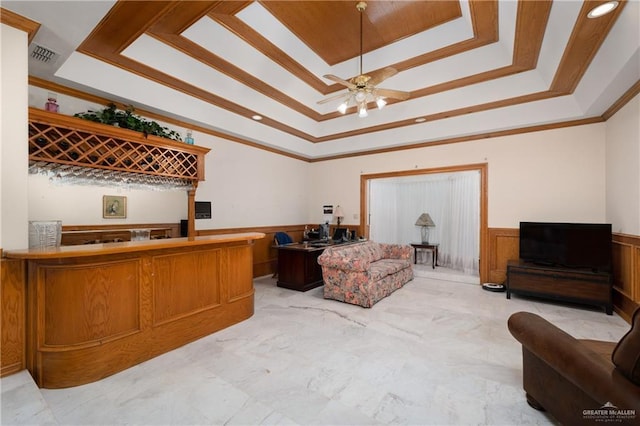 interior space featuring bar area and ceiling fan