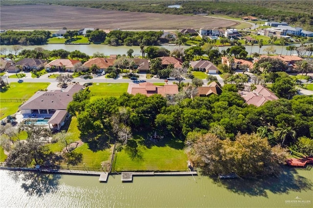 drone / aerial view with a water view