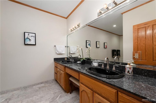 bathroom with vanity and ornamental molding