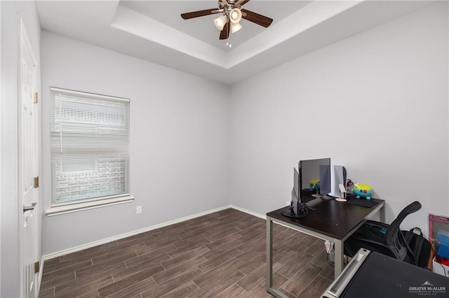 909 N Maryland St, Alton, TX 78573 - home office featuring ceiling fan, wood finished floors, baseboards, and a tray ceiling