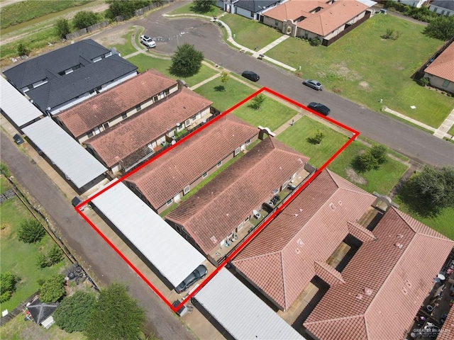 303 S Ridge Ln, San Juan, TX 78589 - aerial view of residential area with property parcel outlined