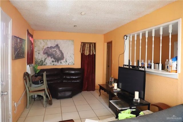 tiled living room with a textured ceiling