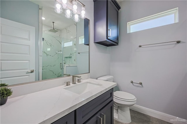 8043 N 50th St, Mcallen, TX 78504 - bathroom with baseboards, a marble finish shower, toilet, and vanity