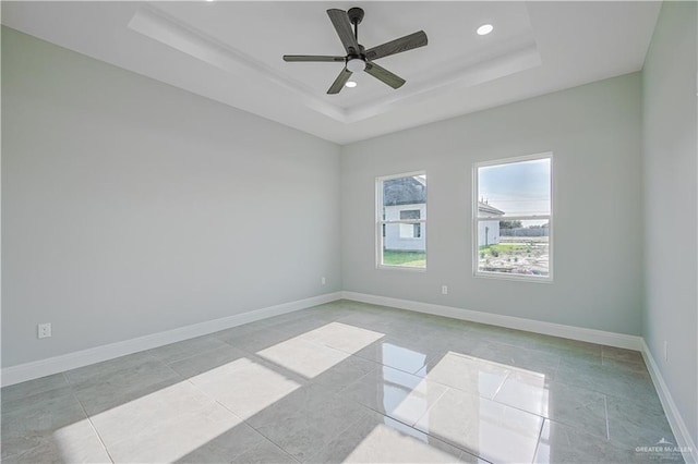 8043 N 50th St, Mcallen, TX 78504 - unfurnished room with a raised ceiling, ceiling fan, baseboards, and recessed lighting