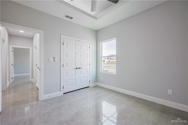 8043 N 50th St, Mcallen, TX 78504 - unfurnished bedroom featuring baseboards, visible vents, ceiling fan, and a closet