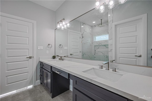 8043 N 50th St, Mcallen, TX 78504 - bathroom featuring a sink, a marble finish shower, baseboards, and double vanity