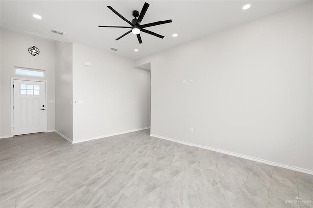 interior space with recessed lighting, visible vents, baseboards, and ceiling fan