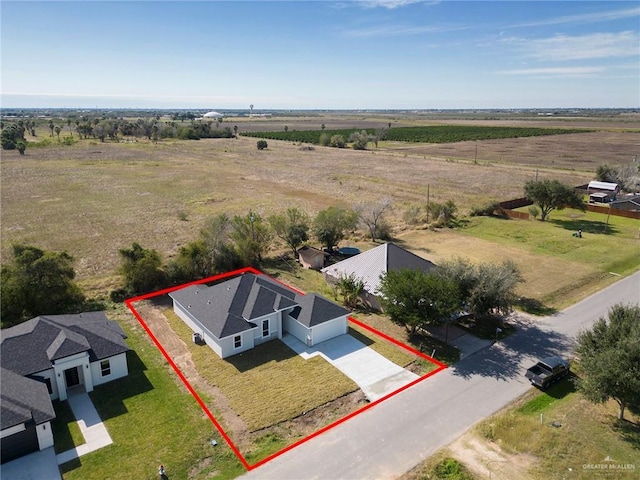 birds eye view of property featuring a rural view