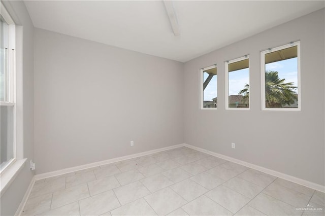 6300 Cascada Bend Rd, Mcallen, TX 78504 - spare room featuring baseboards and light tile patterned flooring