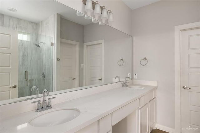 6300 Cascada Bend Rd, Mcallen, TX 78504 - bathroom featuring a stall shower and double vanity