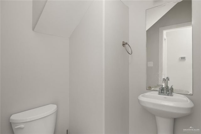 6300 Cascada Bend Rd, Mcallen, TX 78504 - half bathroom with toilet and a sink