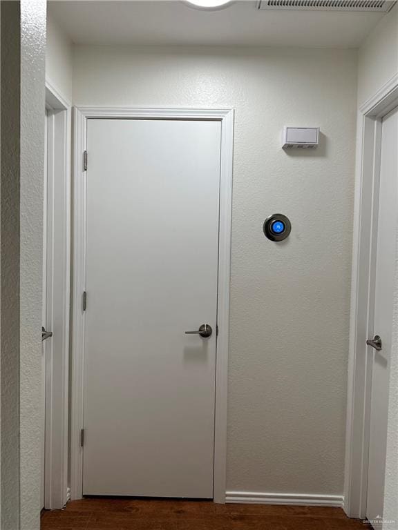 1523 Evergreen Ave, Mission, TX 78572 - doorway to outside featuring dark wood finished floors
