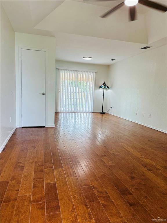 1523 Evergreen Ave, Mission, TX 78572 - spare room with a ceiling fan and dark wood-style floors