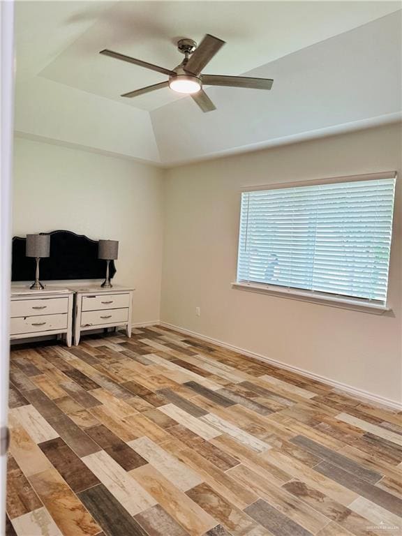 1523 Evergreen Ave, Mission, TX 78572 - empty room with ceiling fan, wood finished floors, and lofted ceiling