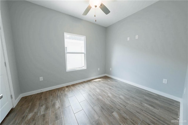 2605 Sage Dr, Weslaco, TX 78596 - empty room with a ceiling fan, baseboards, and wood finished floors