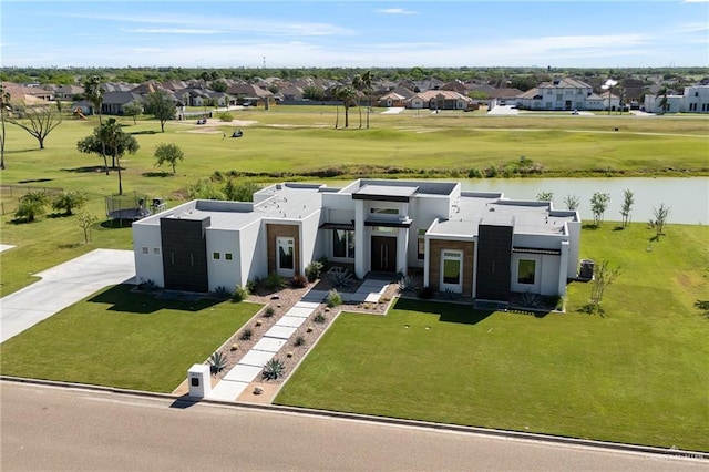 view of front of home with a water view