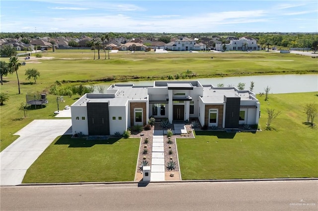 view of front of house featuring a water view