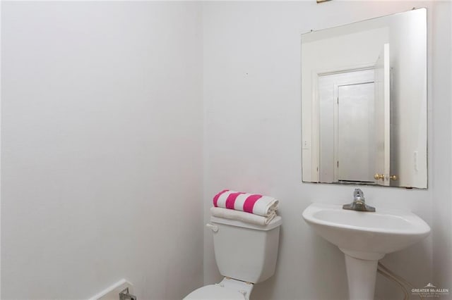 bathroom featuring toilet