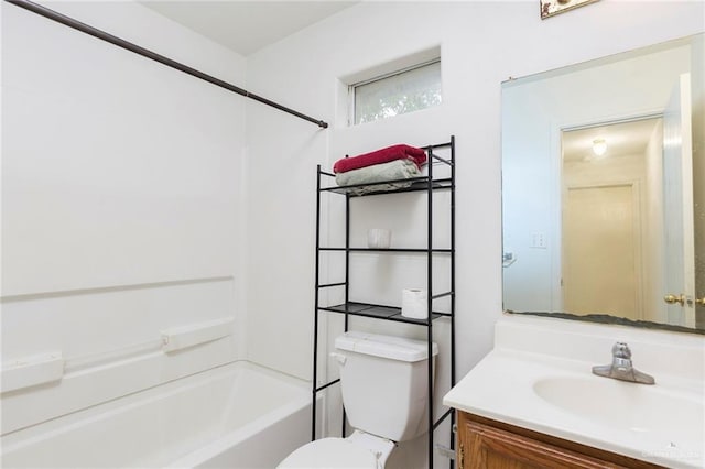 full bathroom featuring shower / bathing tub combination, vanity, and toilet