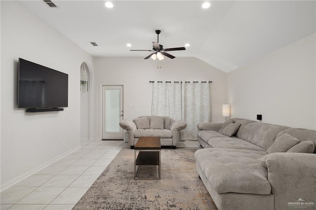 living room with light tile patterned floors, lofted ceiling, recessed lighting, a ceiling fan, and baseboards