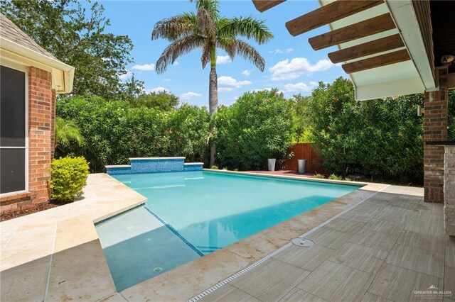 view of pool featuring a patio area