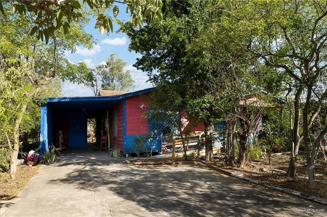 view of front of house with a carport