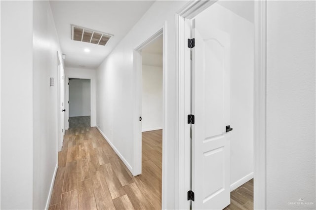 hall featuring light hardwood / wood-style flooring