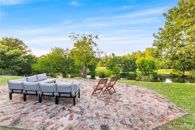 136 W Evergreen St, Boerne, TX 78006 - view of patio / terrace featuring outdoor lounge area, a water view, and view of wooded area